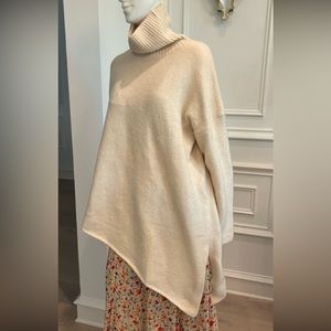 Ivory Turtleneck Knit Sweater with Asymmetric Hem